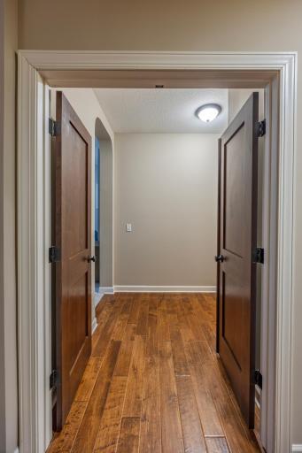 French Doors to Main Floor Primary Bedroom Suite!