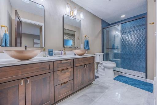 En-suite bathroom, including dual sinks walk-in shower, and raised soaking tub!