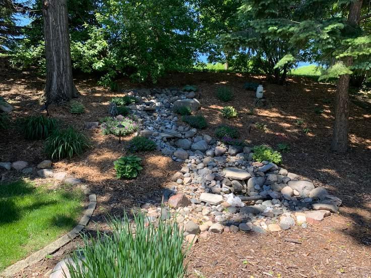 Pondless Waterfall off of the 4 Season Porch