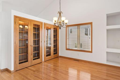 Dining area with wonderful built-ins to showcase your dishware or collections and would even make a beautiful bar