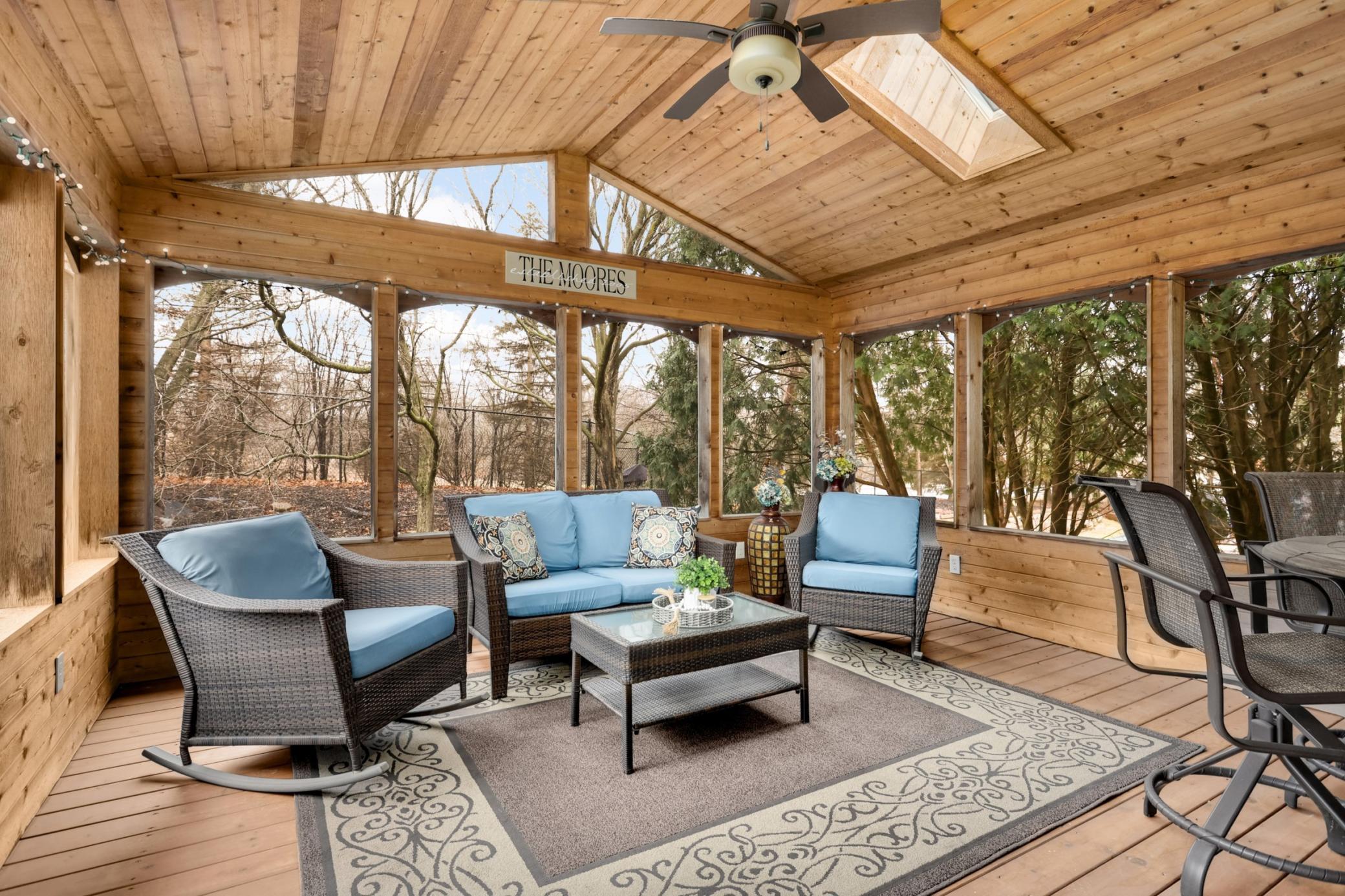 Oversized screen porch complete with two skylight windows, a ceiling fan and a step out to a composite deck. The backyard has a gate in the fence for quick access to the MN River Bluff LRT Regional Trail.