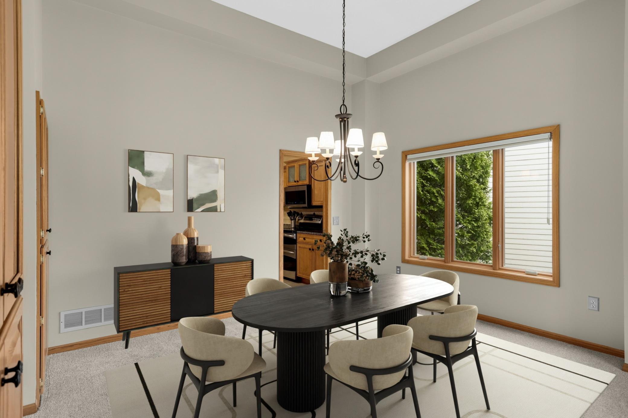 Formal dining area high ceilings & built in storage along with easy access to kitchen or the ease of enjoying an after dinner cocktail in the attached formal living room.