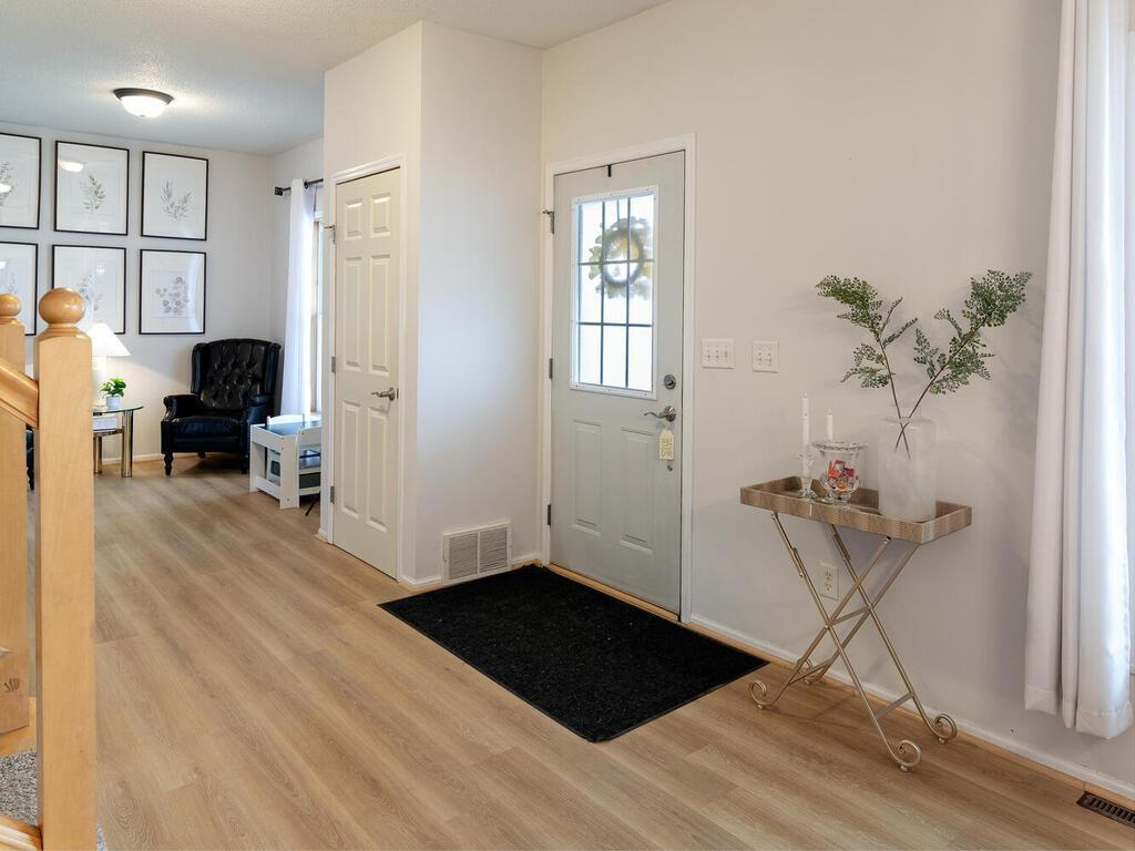 You will never feel cramped in this foyer while entertaining.