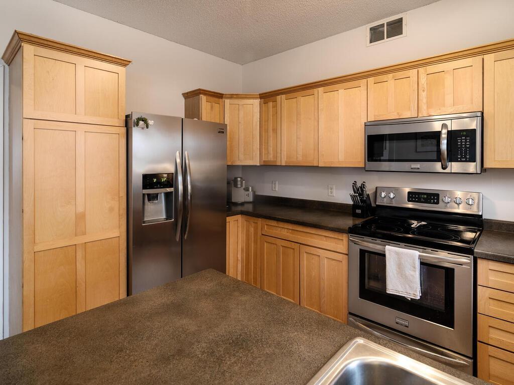 The kitchen has been updated with SS appliances.