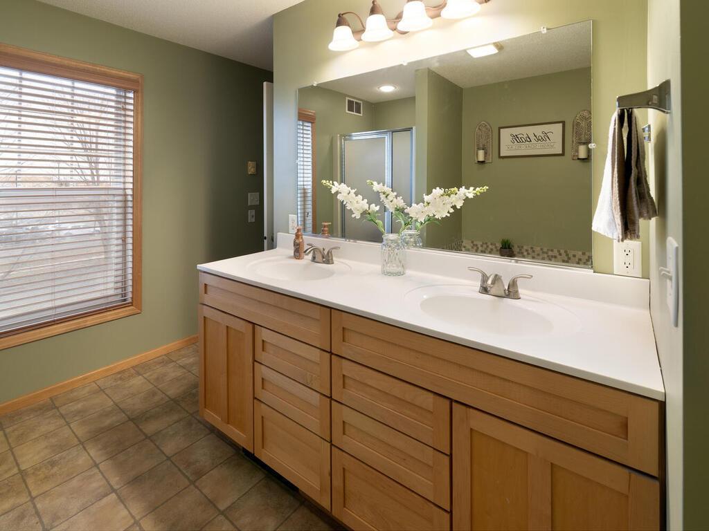 The spaciousness continues in the ensuite with a long double vanity.