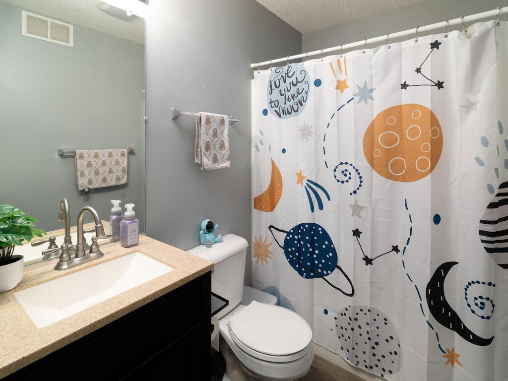 At the top of the stairs is a full bath.