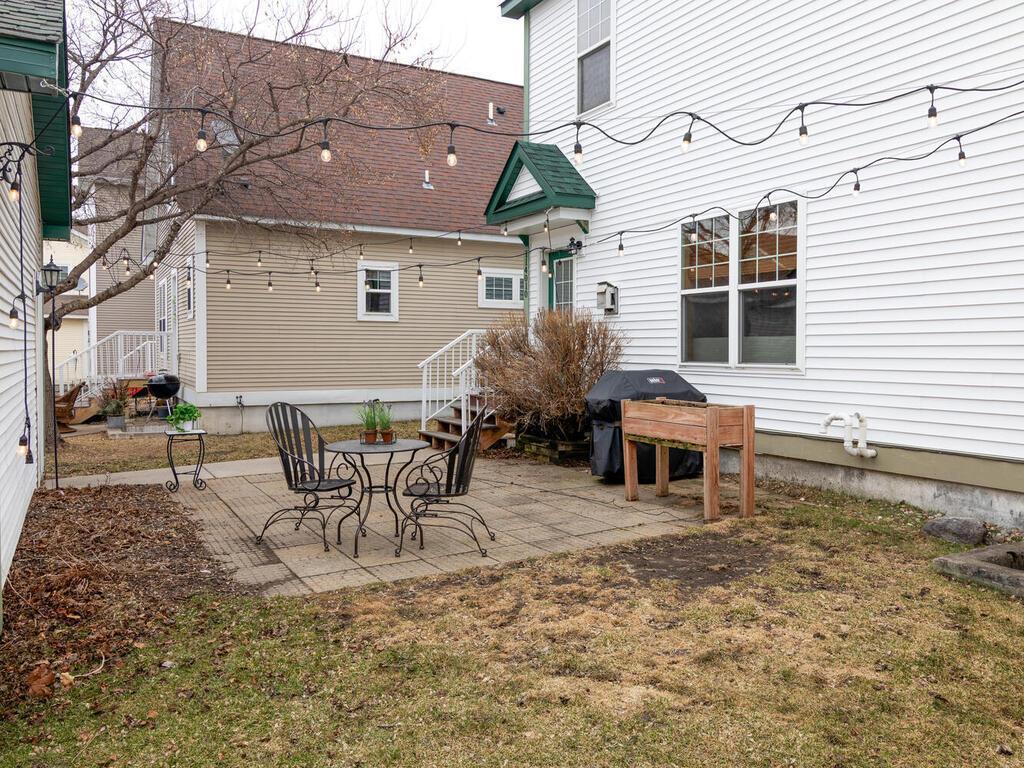 Entertain on the patio under twinkly lights that will stay with the property.