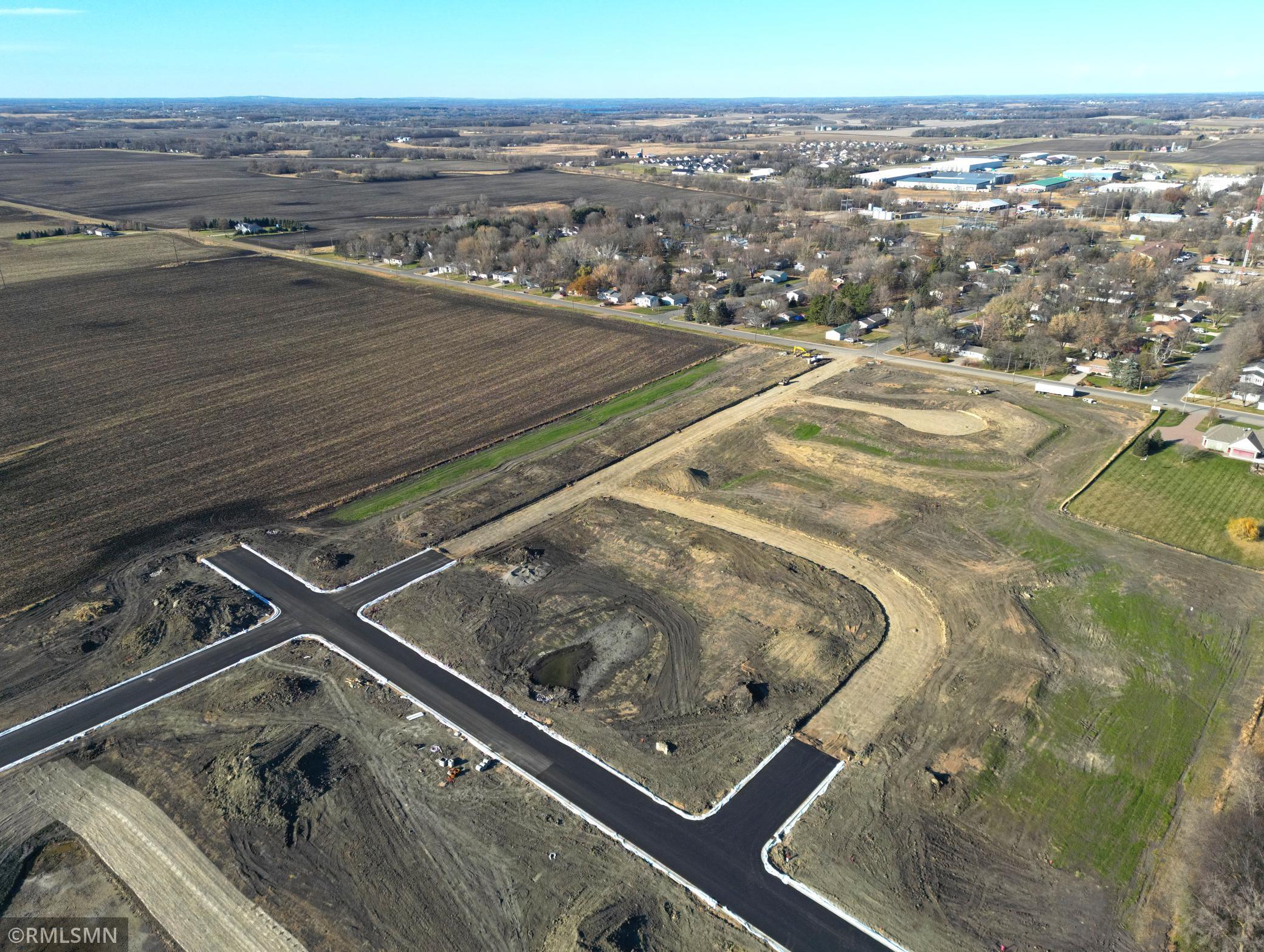 The roads are in in the 1st phase and rest of the roads will be finished in the spring. The lot being offered is in the 2nd phase.