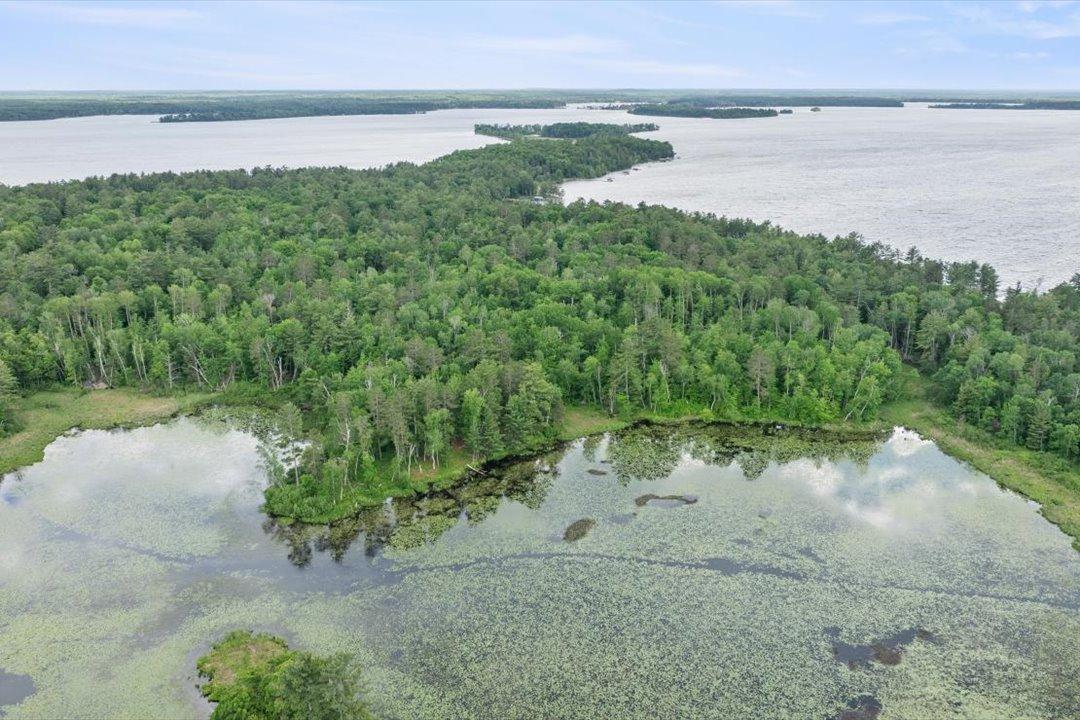 Mature woods and 17.67 acres create a beautiful Northwoods setting with waterfront, recreation, and potential for a future homesite.