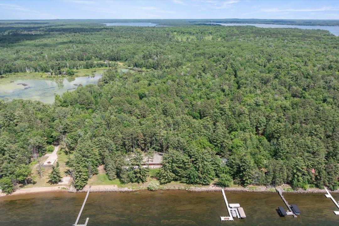 An extraordinary setting among the lakes and forests of the Whitefish Lakes Area, with water access to the 14 connected lakes of the Whitefish Chain.