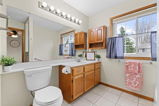 The private primary bathroom features a separate bath tub and shower, and a walk-in closet!