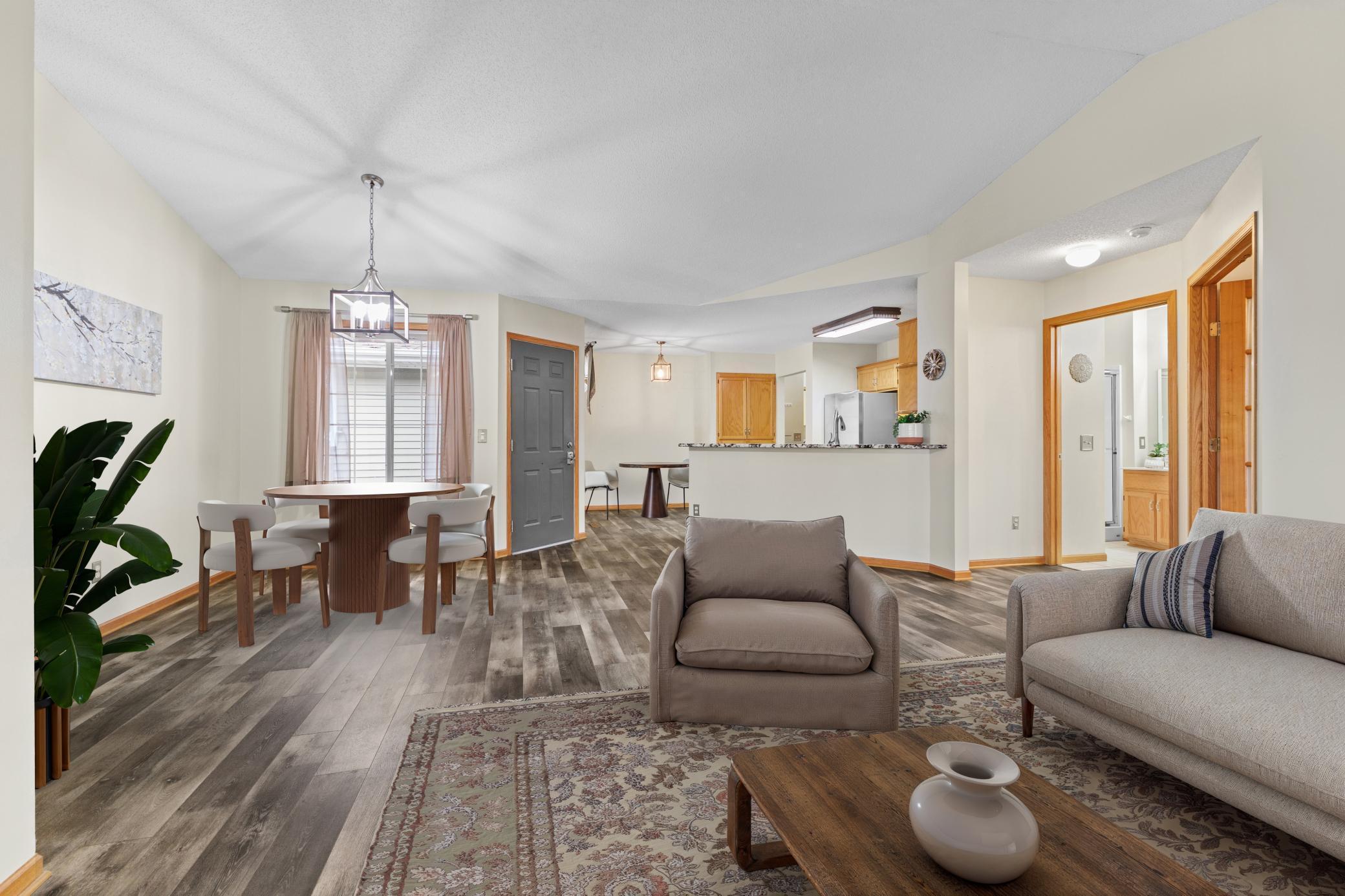 Living Room to Casual Dining, Kitchen View - please note this image has been virtually staged.