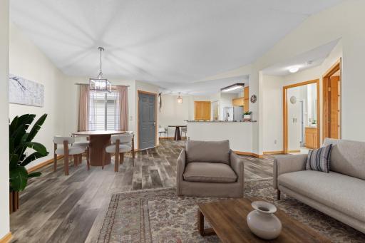 Living Room to Casual Dining, Kitchen View - please note this image has been virtually staged.