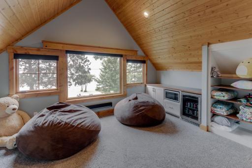 Bunk movie screen above window