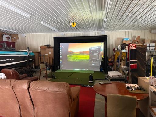 golf simulator in detached garage