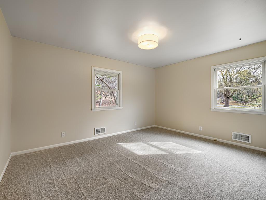 Bright and roomy second bedroom on the main floor