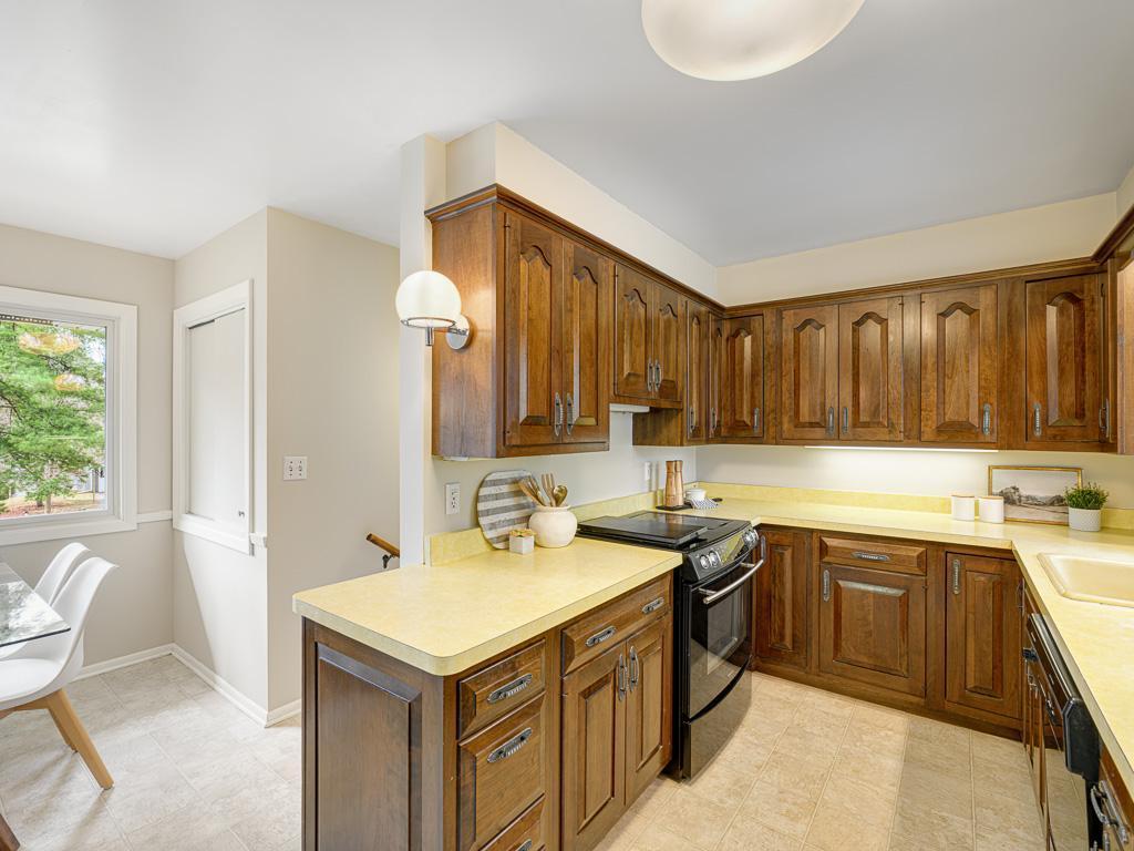 Functional kitchen linking dining and gathering spaces