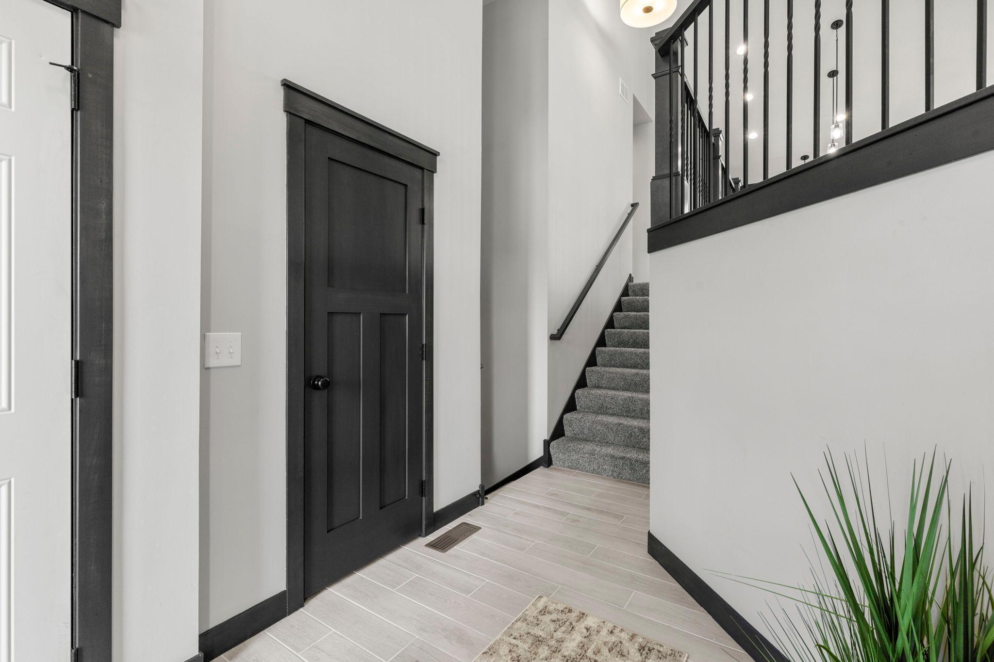 Move in ready! Just like new with stylish, neutral colors and gorgeous Craftsmans style doors and open staircase. Just like new with upgraded tiled foyer and bathroom floors.