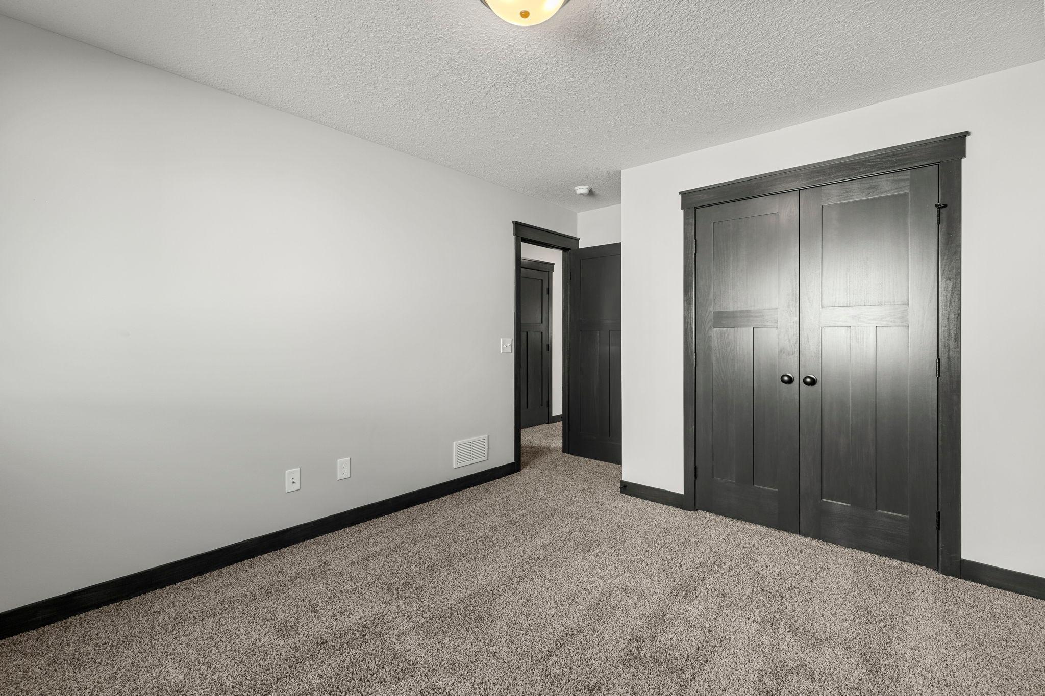 Spacious home! 5 bedrooms, 2 in the lower level are fabulous flex spaces - bedrooms, office, playroom. Shows just like new and MOVE IN READY!