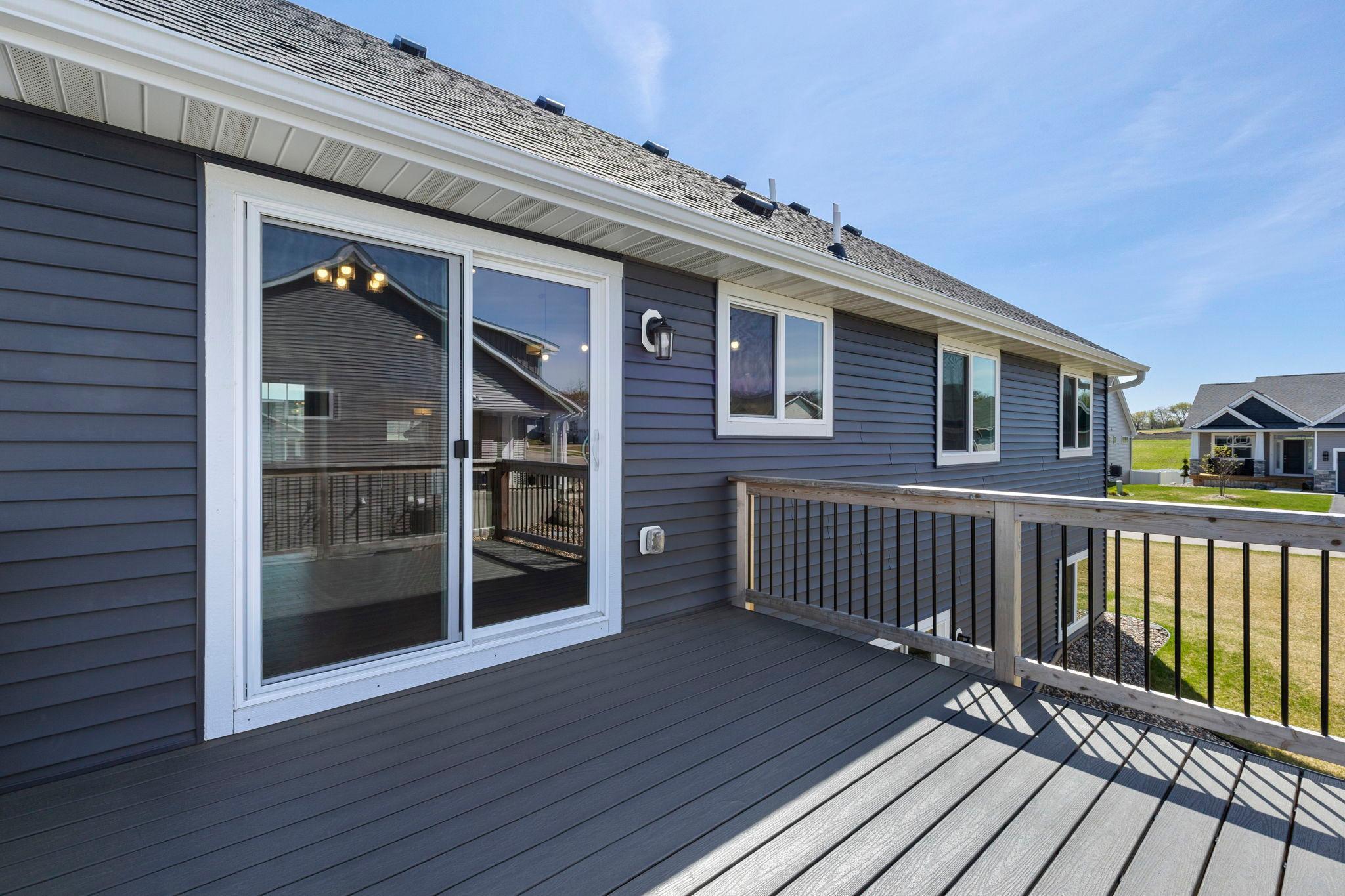 Shows just like new with DECK already built, no add on! Awesome upgrade just in time for summer BBQs. Move in ready. Don't wait to build!