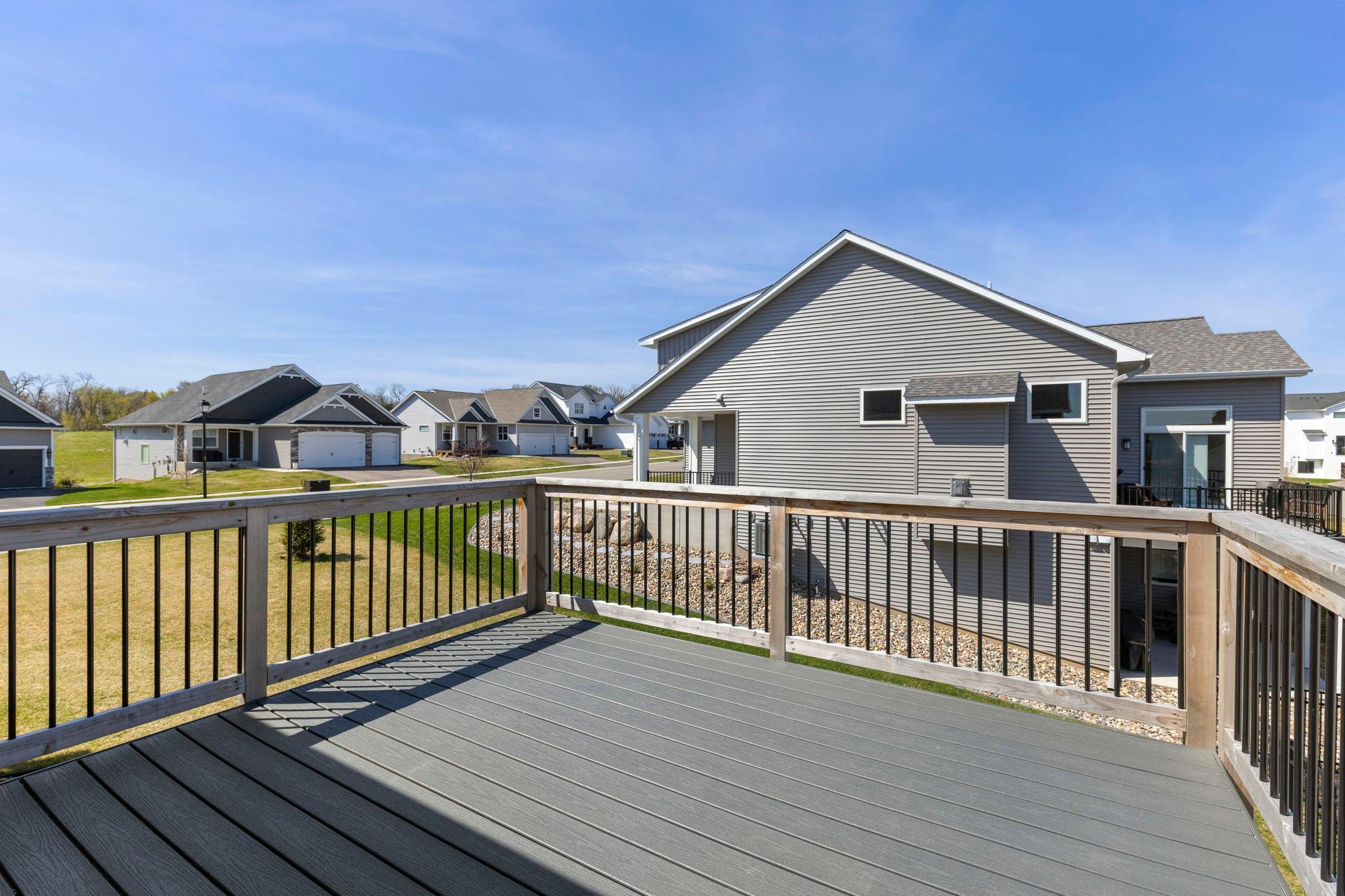 Shows just like new with DECK already built, no add on! Awesome upgrade just in time for summer BBQs. Move in ready. Don't wait to build!