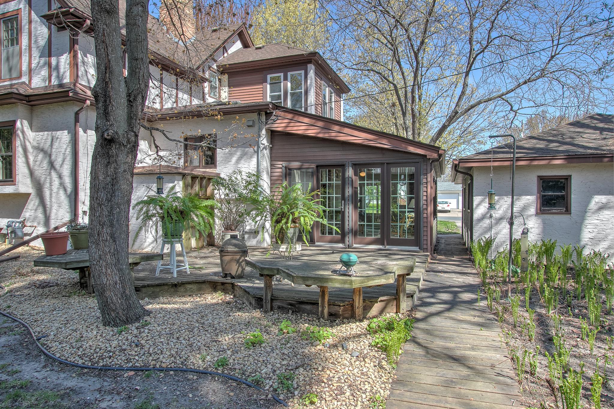 Patio doors lead out to the deck and backyard.