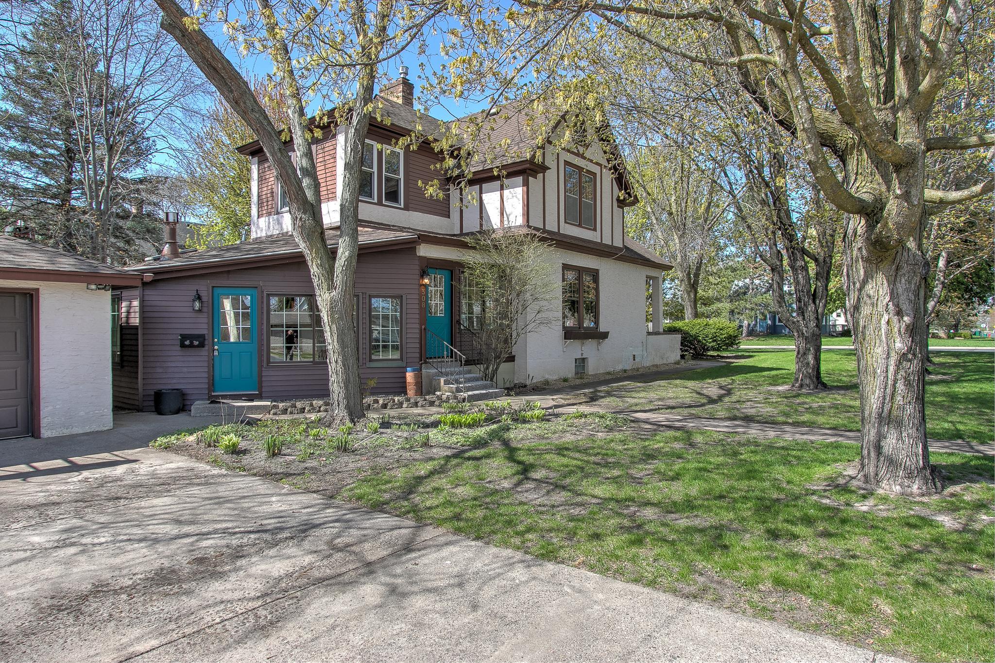 Home has a blend of stucco and metal siding including new gutters and gutter guards.