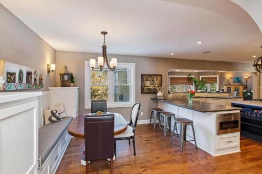 Eat-in kitchen area off office with custom built-ins
