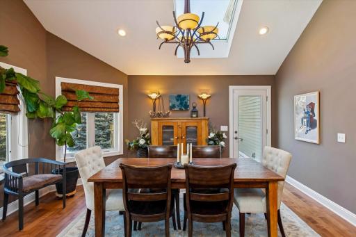 Formal dining room to maintenance free deck & grill area on patio