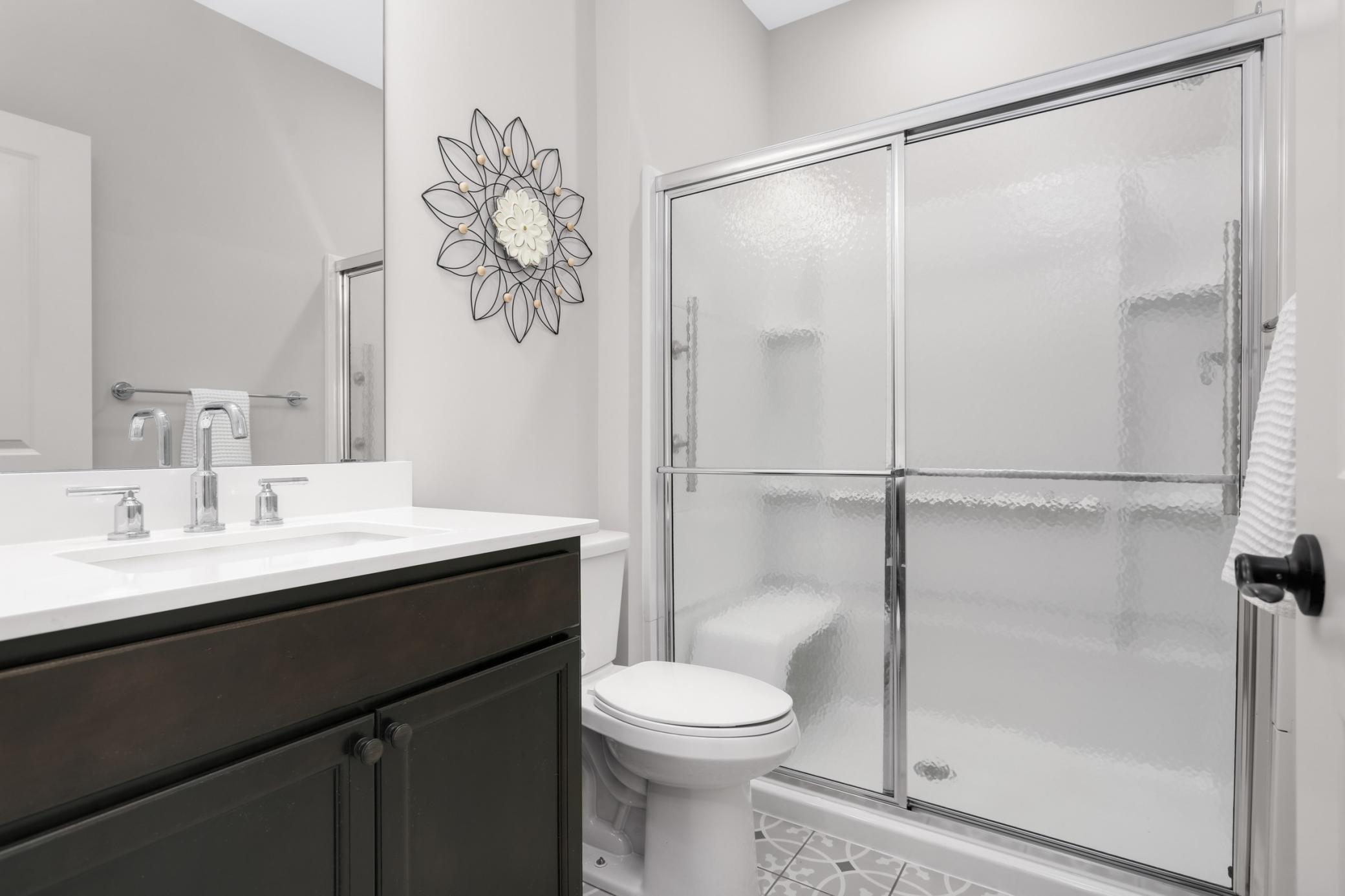 3/4 main level bath directly next to the main level bedroom.