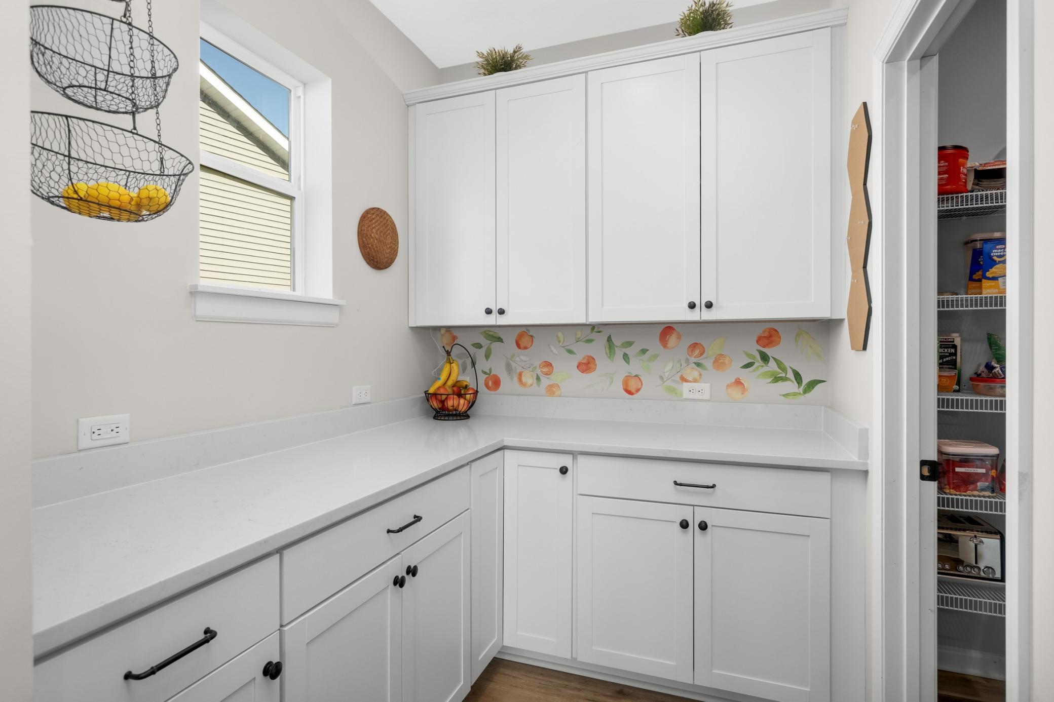 Butler pantry, perfect for your coffee bar:) There is an additional walk-in pantry adjacent.