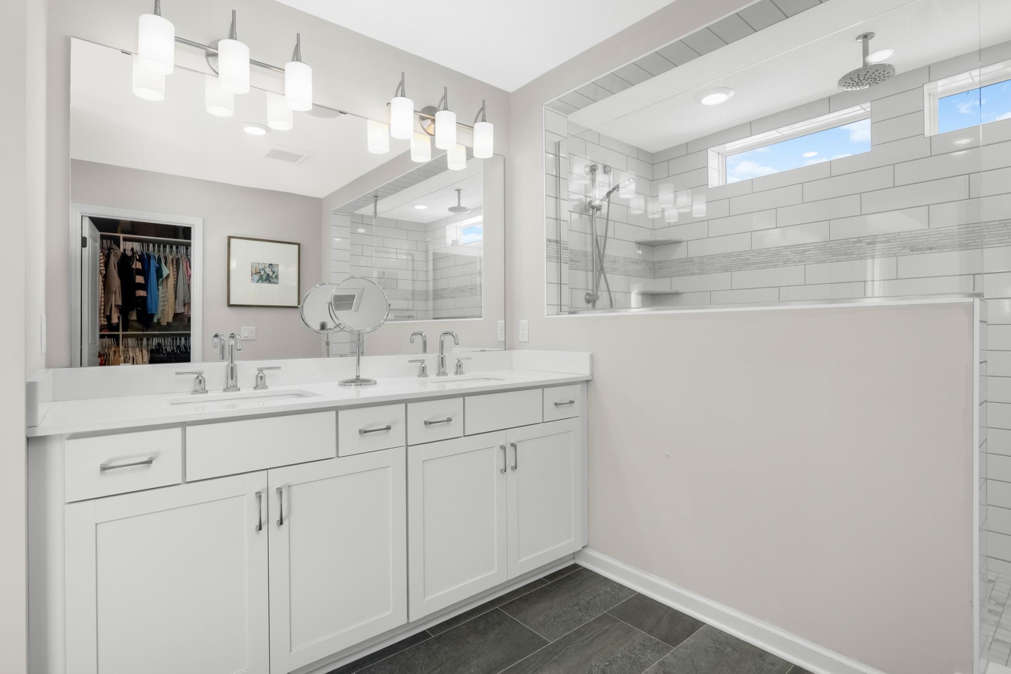 Comfort height double vanity, seperate water closet and walk-in shower.