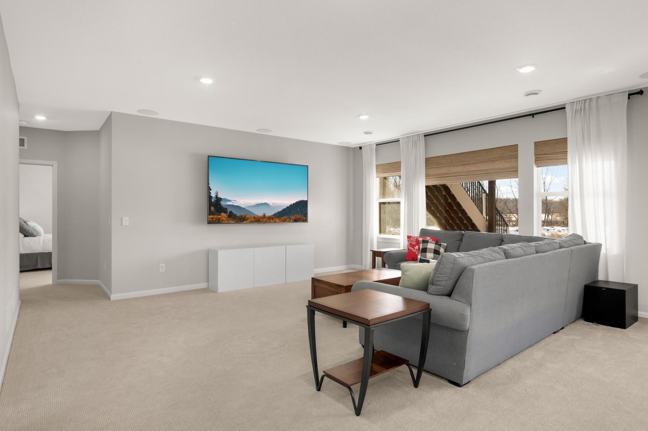 Down to basement! Tall ceilings, recessed lighting and plenty of space to spread out.