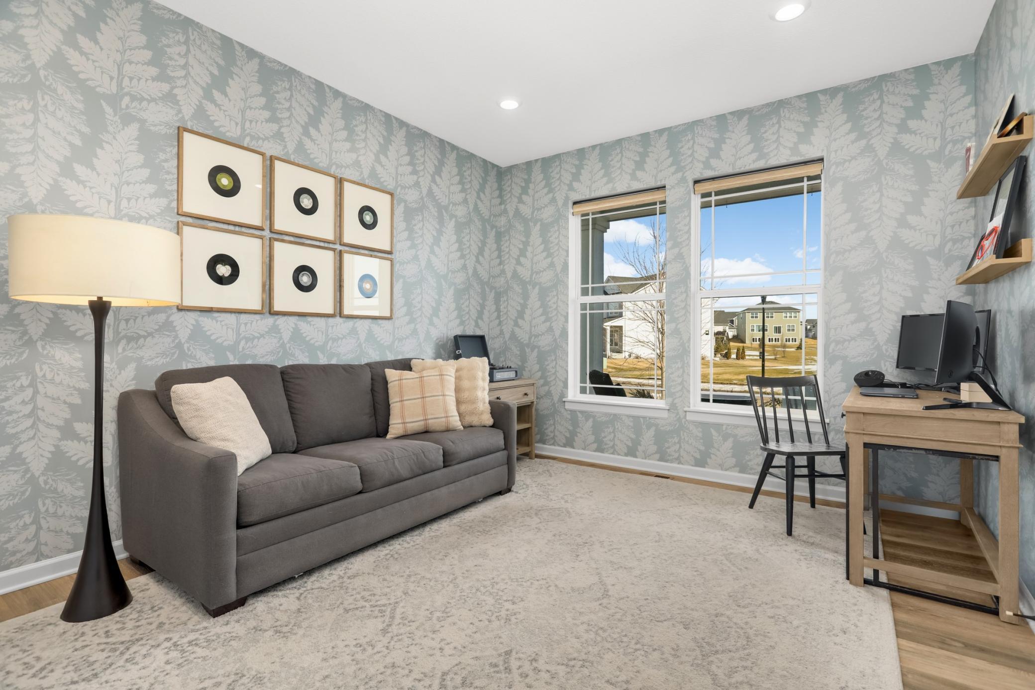 Just off the entry is the office. Double doors for privacy and large windows for plenty of light.