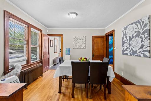 The dining room is spacious for a good sized table and hutch/buffet.
