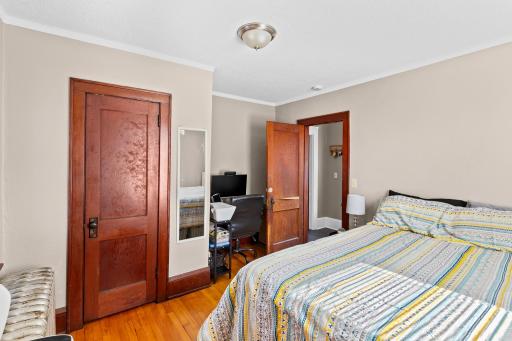 Bedroom #1 has a space behind the door for a desk or dresser.
