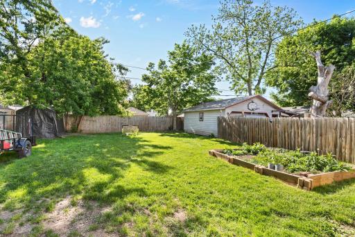 The backyard has room to garden, play and build a garage.