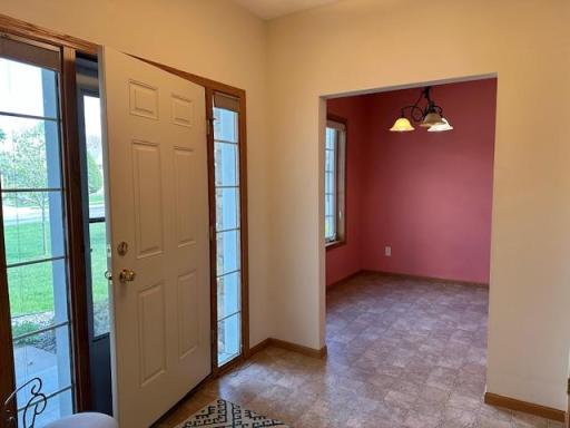 Enter into an open and spacious design with flexible use space and coat closet