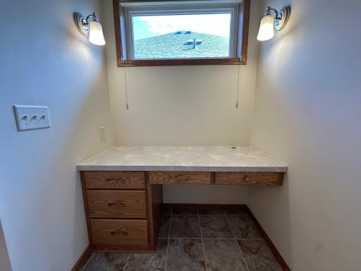 Nice well lit area in primary bath that was used as a make up vanity