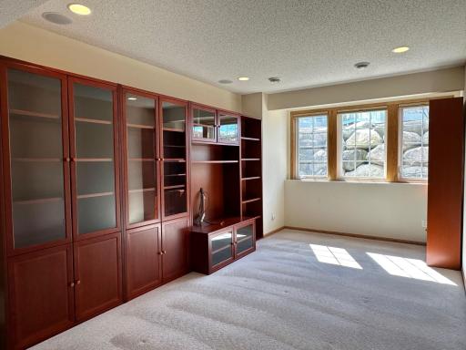 Lets go downstair to enjoy the cabinetry and put together a nice family room