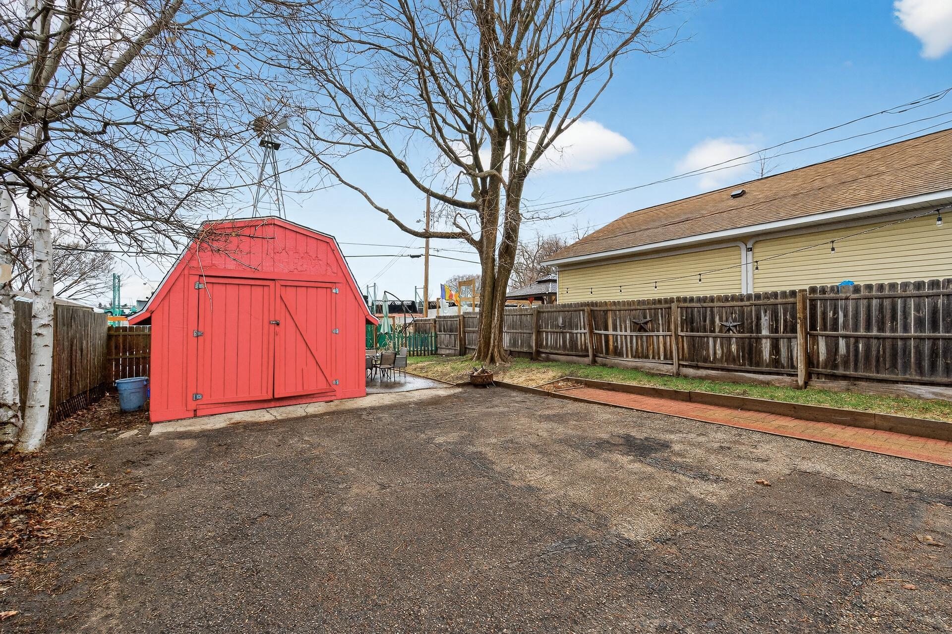 The storage shed in the back has lots of extra storage and electricity.