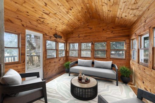 You'll love enjoying nature from your beautifu; 3 season porch! Virtually staged.