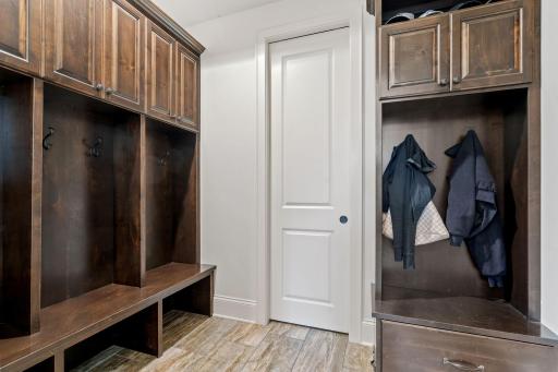 Spacious mudroom with integrated storage.