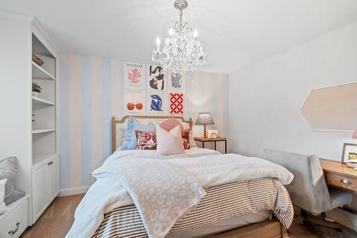 Upper level bedroom with custom built ins.