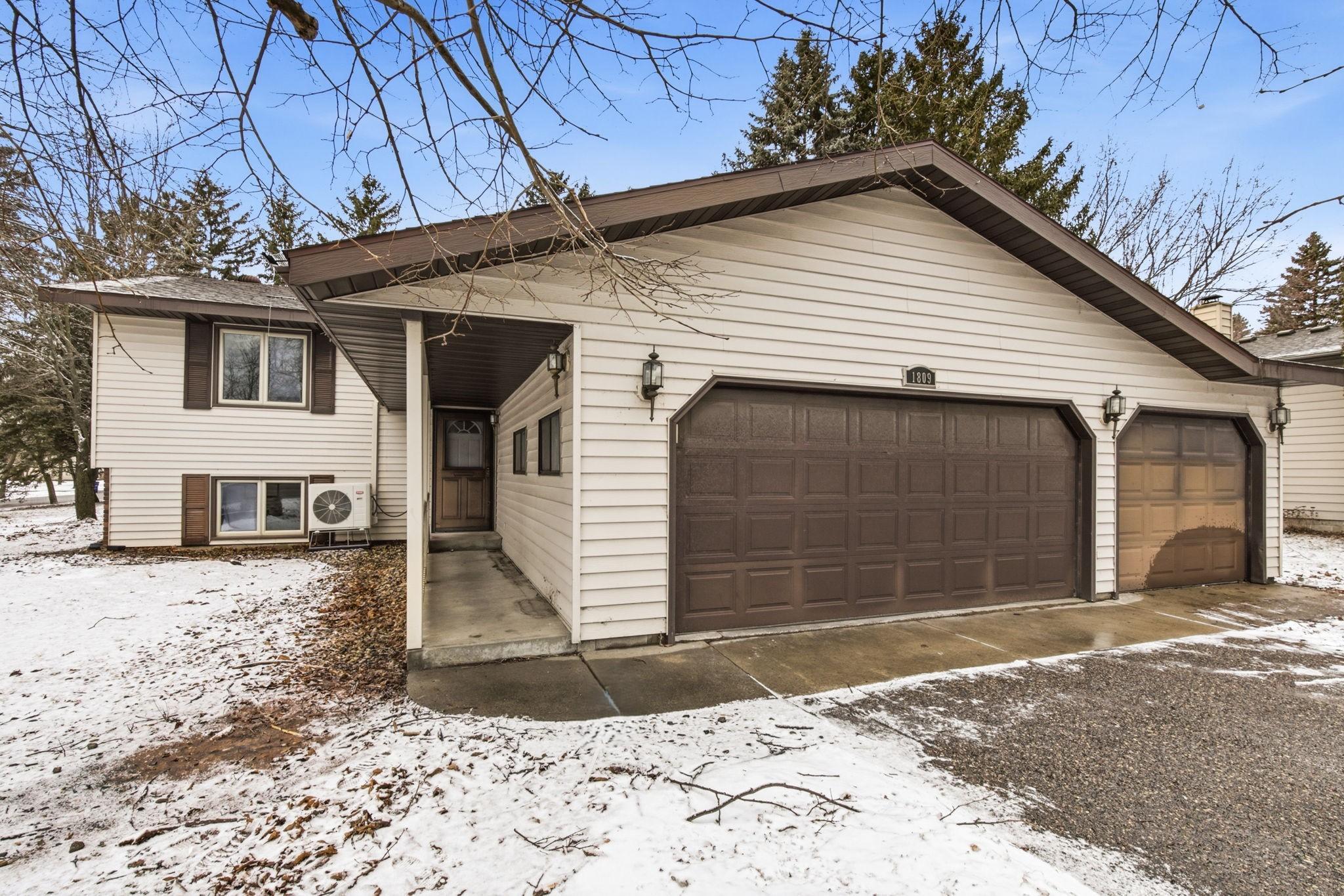 4 bedroom, 2 bath bilevel with 3 stall attached garage!