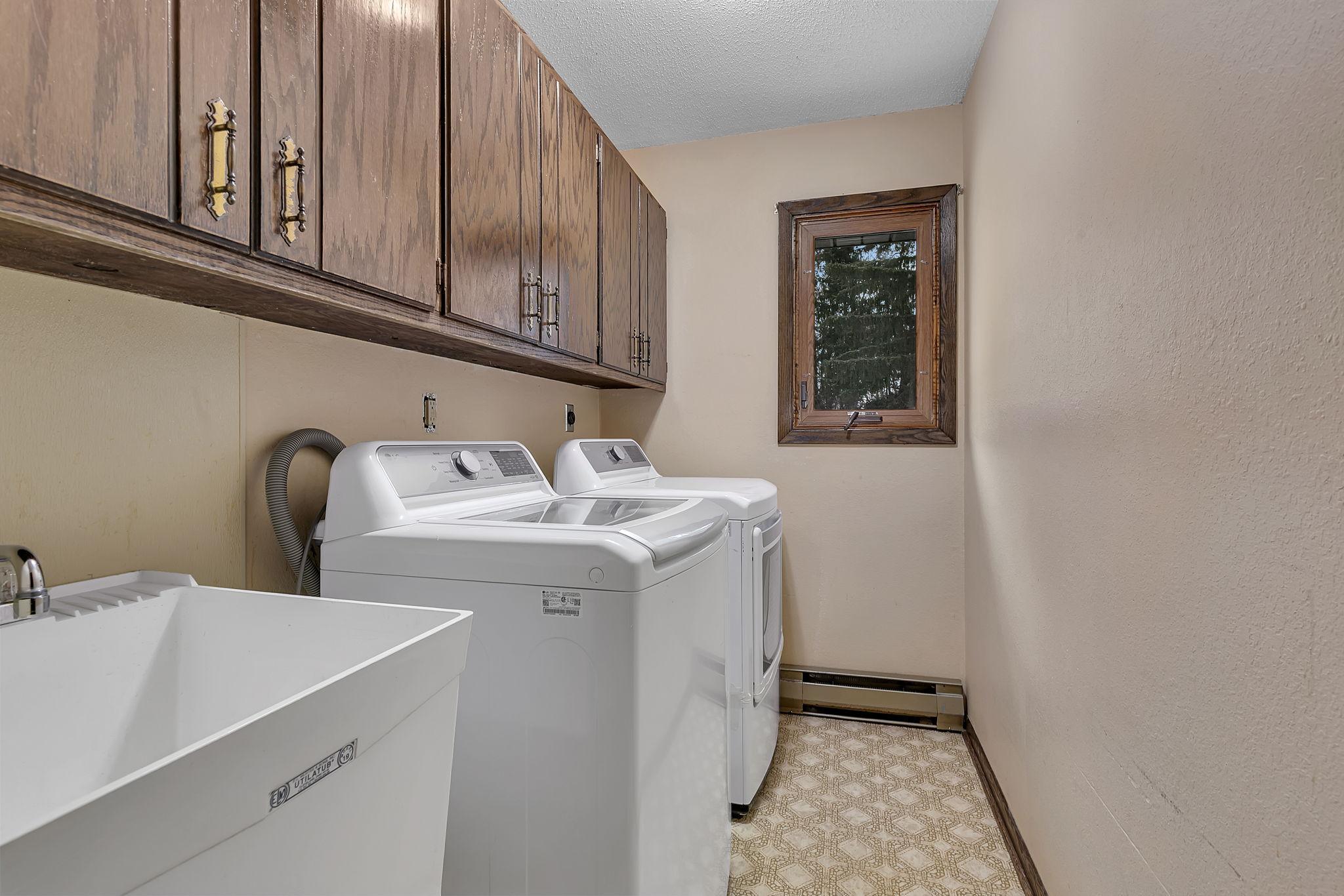 Main floor laundry! Washer & Dryer purchased in 2020