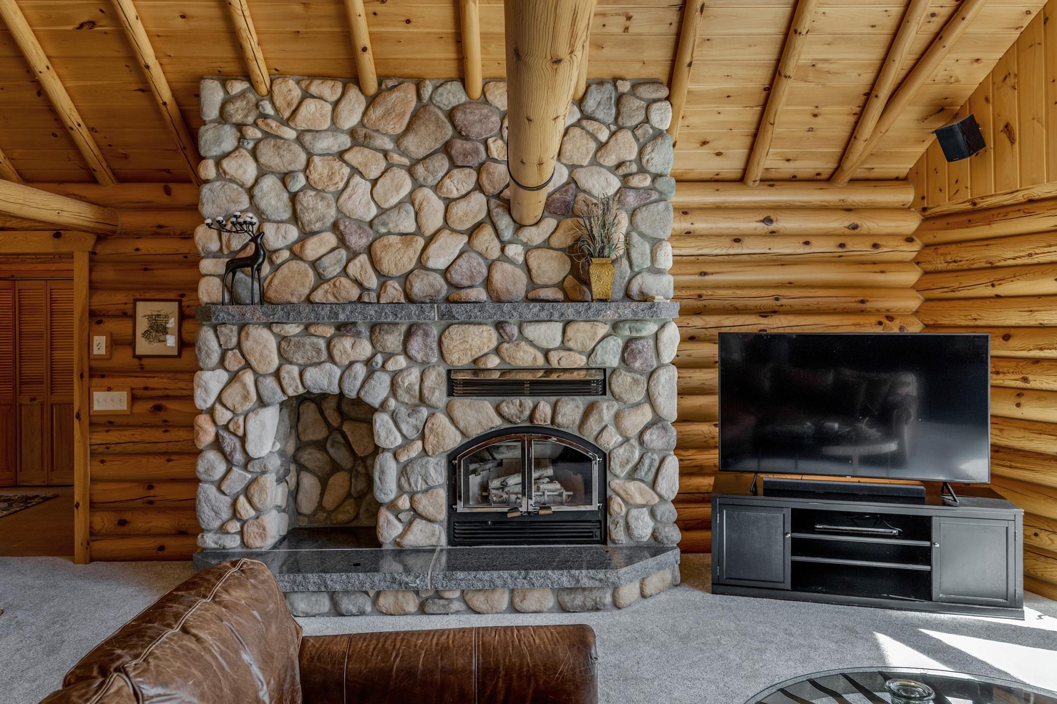 Wood burning stone fireplace