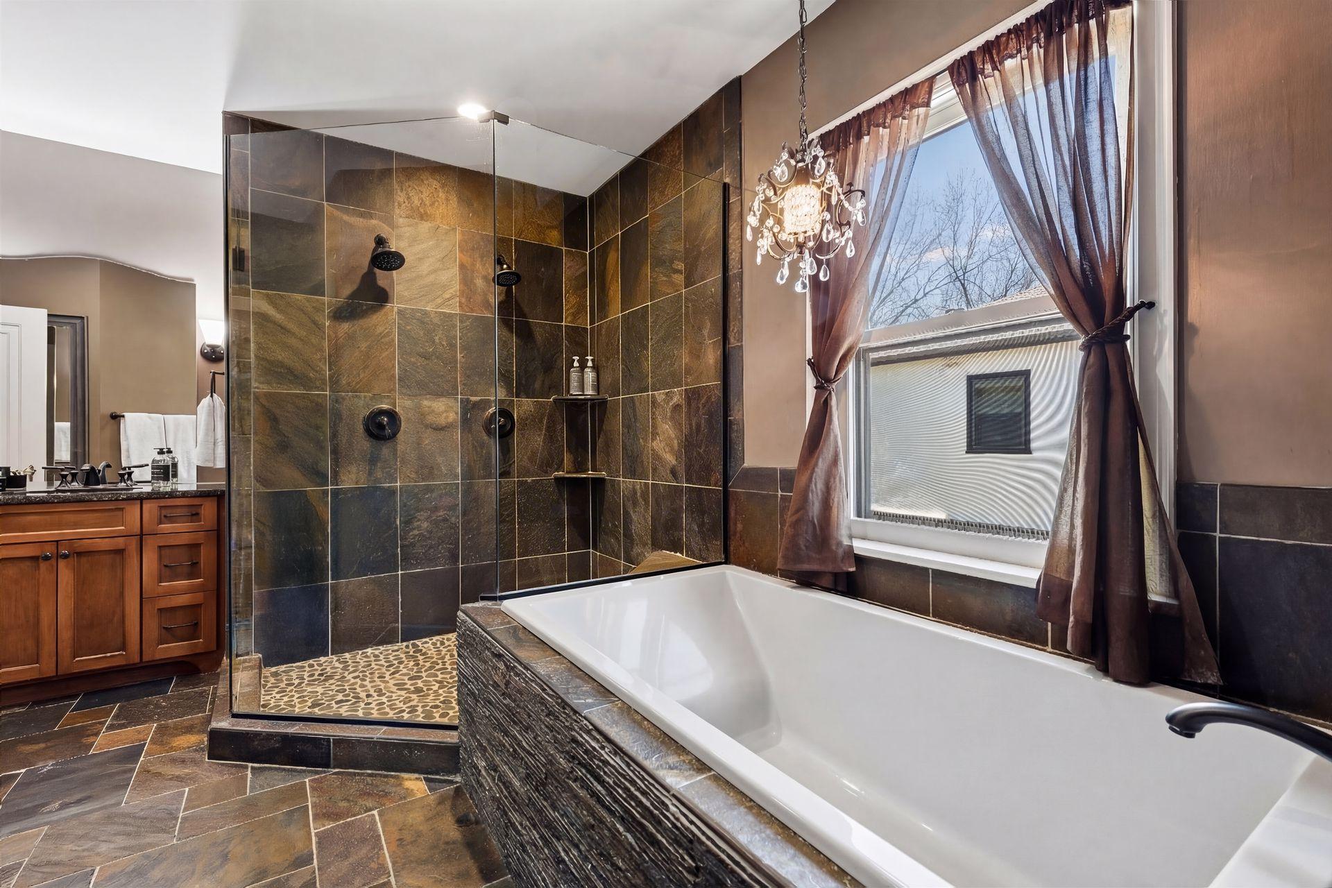 Primary bath has soaking tub & walk-in shower