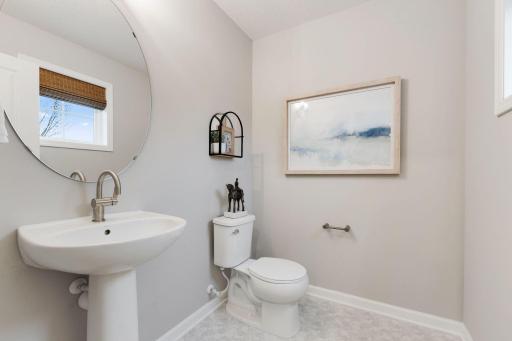 Half bath in the loft offers convenience for hanging out without having to make a trip downstairs.