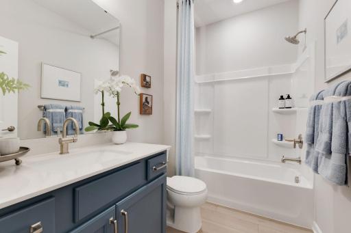 Main bath at the front of the home features a shower/tub combo